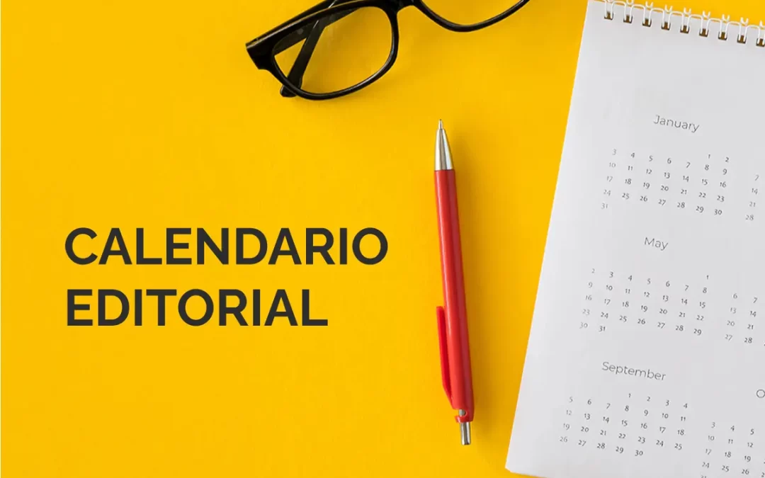 Almanaque con bolígrafo rojo y gafas sobre fondo amarillo corporativo de garajedoce.